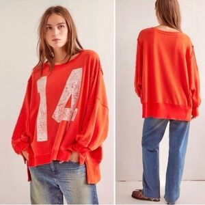 We The Free Bold Orange Sweatshirt with White Print